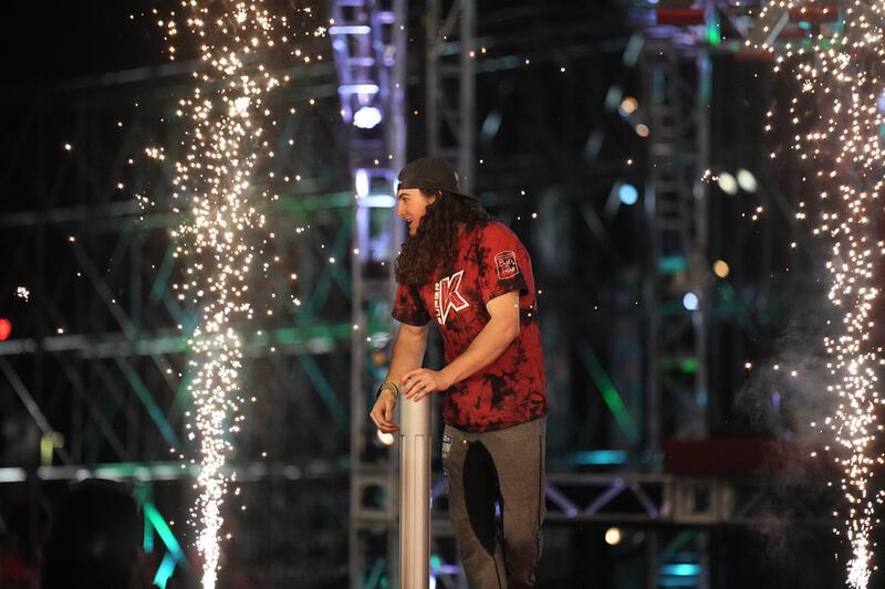 Kaden Lebsack competes in the “American Ninja Warrior” 2022 national finals.