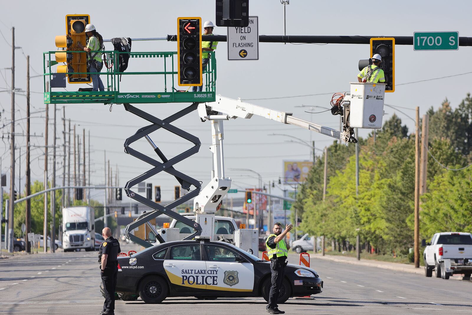Crews add a traffic light at 1700 South, marking the start of the 300 West reconstruction project in Salt Lake City.