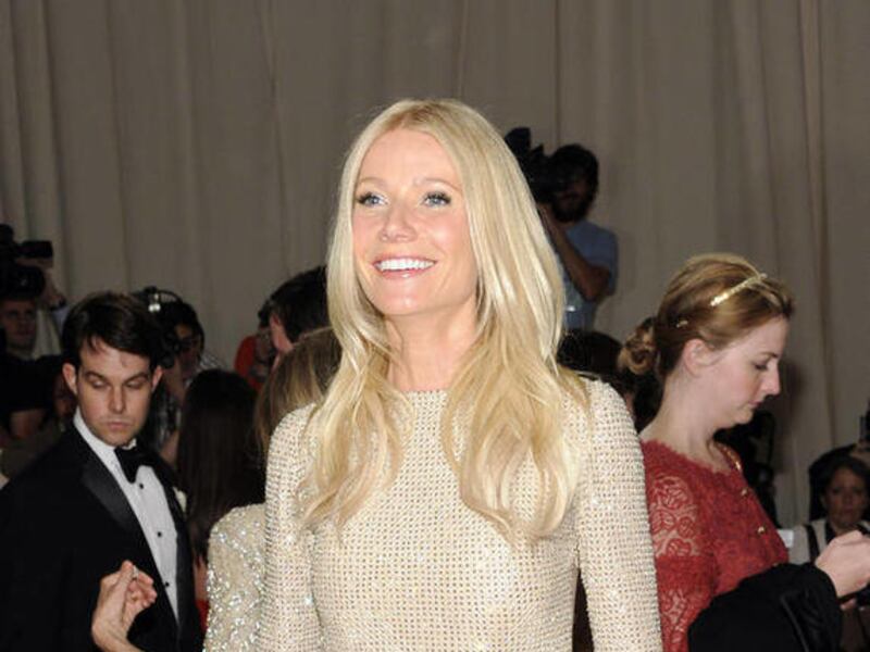 Actress Gwyneth Paltrow arrives at the Metropolitan Museum of Art Costume Institute gala, Monday, May 2, 2011 in New York. Paltrow is auctioning off her 2000 Oscars dress for charity.