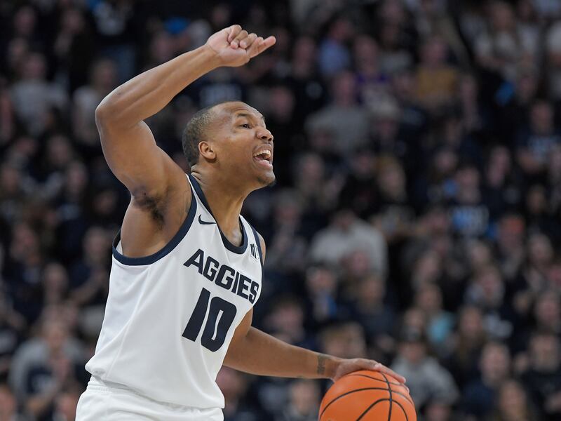 Utah State guard Darius Brown II brings the ball upcourt during game Tuesday, Jan. 9, 2024, in Logan, Utah.