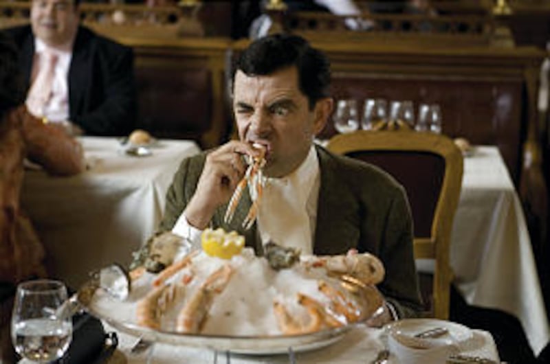 Mr. Bean (Rowan Atkinson) samples some fine cuisine while visiting the French Riviera in the new comedy, "Mr. Bean's Holiday."