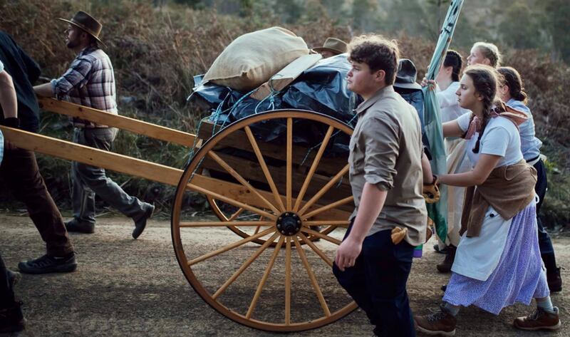 Youth from the Hobart Australia and Devonport Australia stakes push and pull handcarts during their trek in Tasmania in October 2024.