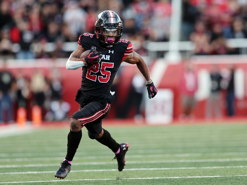Utah receiver Jaylen Dixon looks for yardage as Utah and USC play at Rice-Eccles Stadium in Salt Lake City, Oct. 15, 2022.