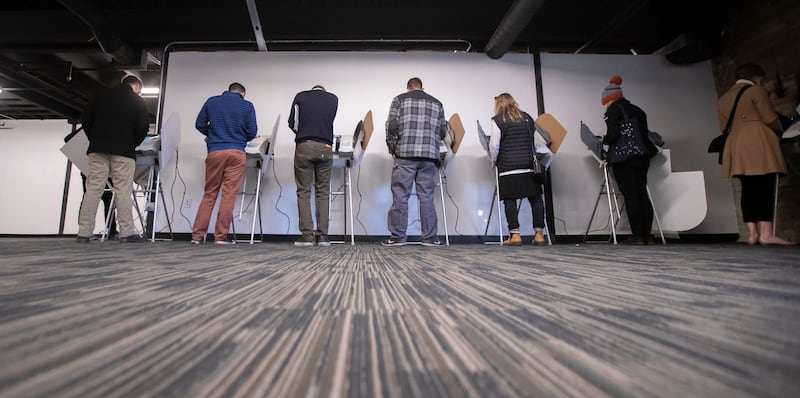 Voters cast their ballots at a polling station at Trolley Square in Salt Lake city on Tuesday, Nov. 6, 2018.