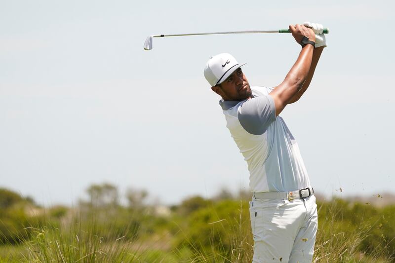 Tony Finau hits on the fifth tee during the PGA Championship’s third round on May 22, 2021.