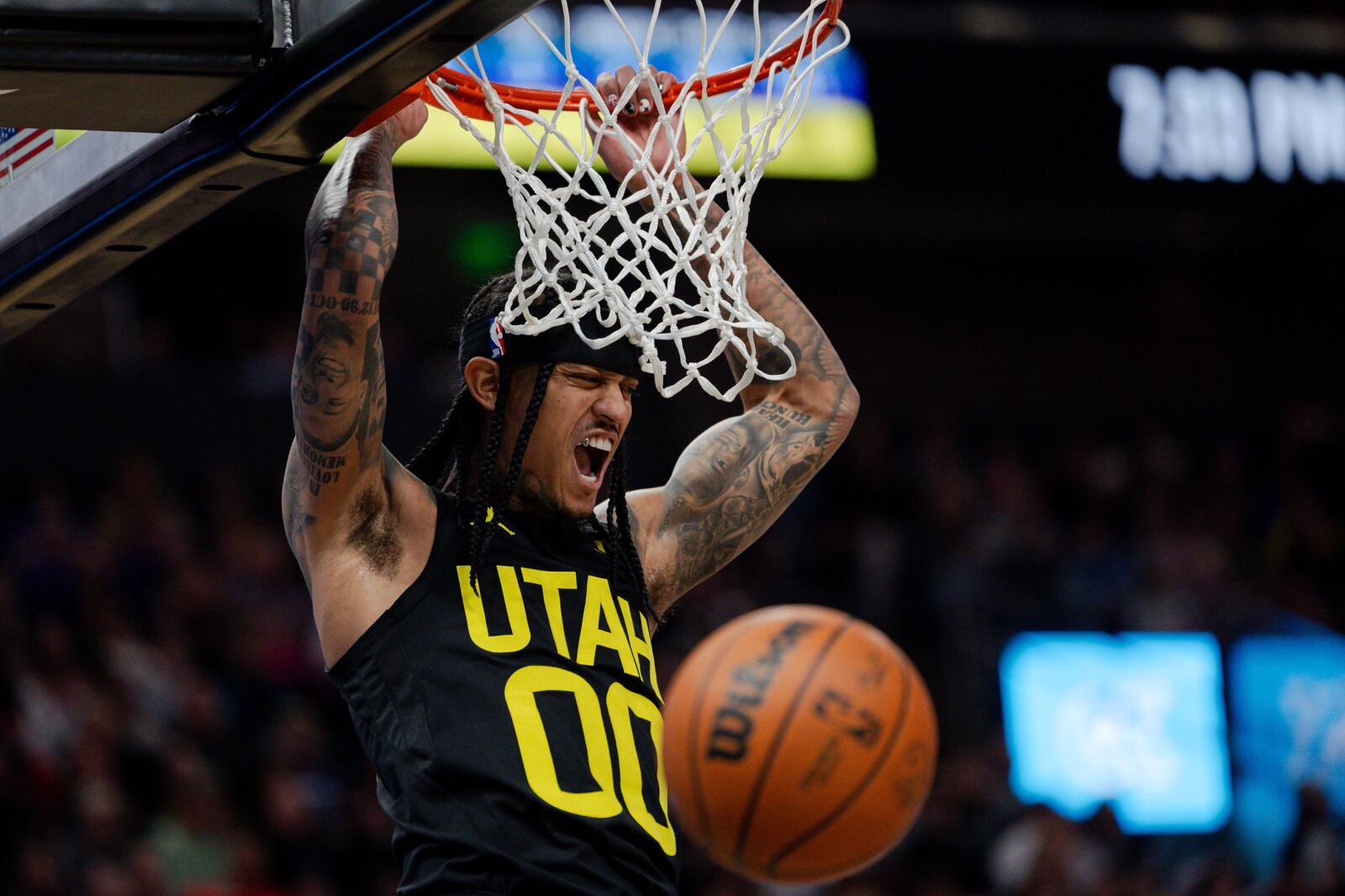 Utah Jazz guard Jordan Clarkson (00) dunks during an NBA game between the Jazz and the Dallas Mavericks at the Delta Center on Jan. 1, 2024.