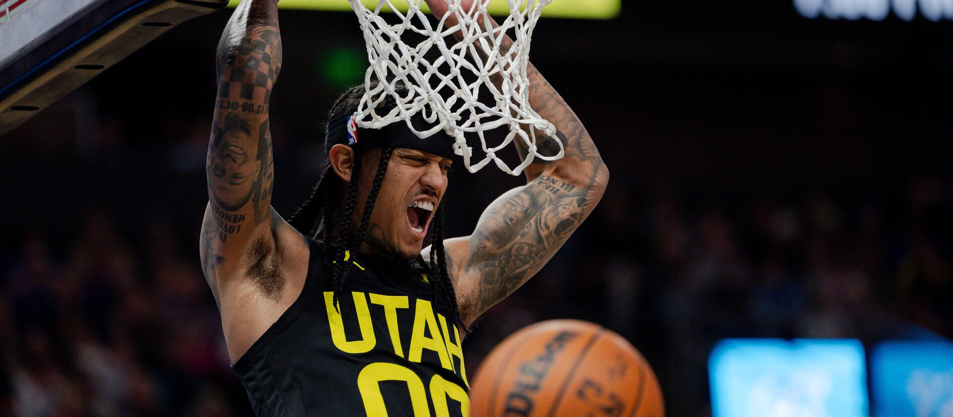 Utah Jazz guard Jordan Clarkson (00) dunks during an NBA game between the Jazz and the Dallas Mavericks at the Delta Center on Jan. 1, 2024.
