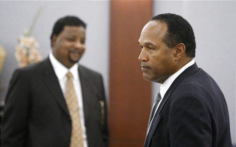 O.J. Simpson and co-defendant Clarence "C.J." Stewart appear in court during their trial at Clark County Regional Justice Center Monday in Las Vegas, Nevada.