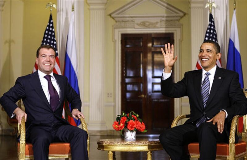 In this April 1, 2009 file photo, U.S. President Barack Obama, right, and Russian President Dmitry Medvedev smile during their meeting ahead of the G20 summit in London.