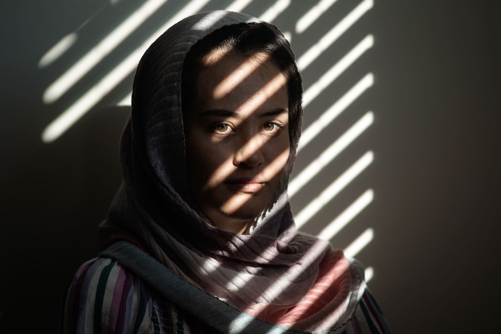 Afghan refugee Shazia Kakaie poses for a portrait at her house in North Salt Lake.