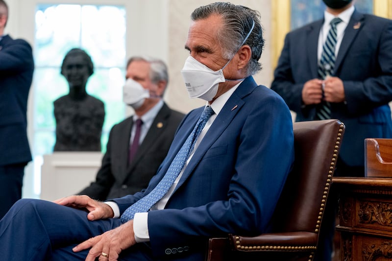 Sen. Mitt Romney, R-Utah, in a White House meeting with President Joe Biden and others to discuss his jobs plan.