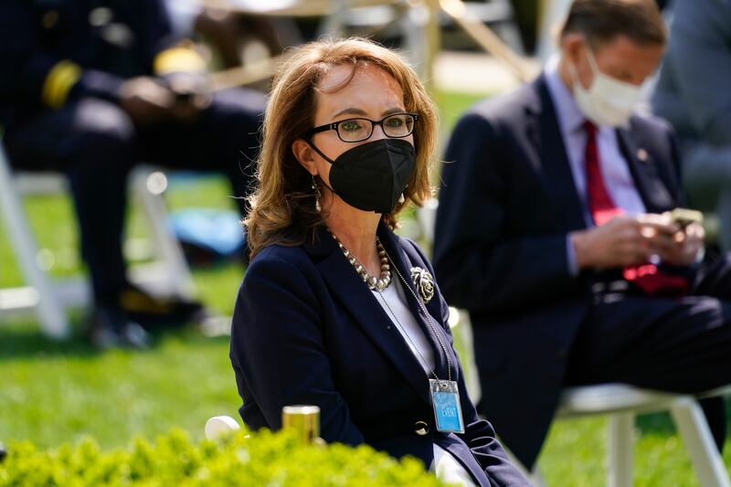 Former Rep. Gabby Gifford, D-Ariz., is seated before an event on gun violence prevention in the Rose Garden at the White House, Thursday, April 8, 2021, in Washington.