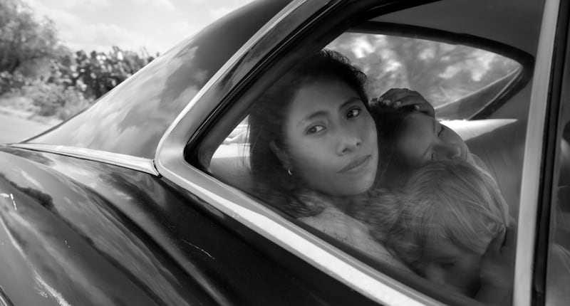 Marco Graf, Yalitza Aparicio and Daniela Demesa in "Roma," by filmmaker Alfonso Cuaron.