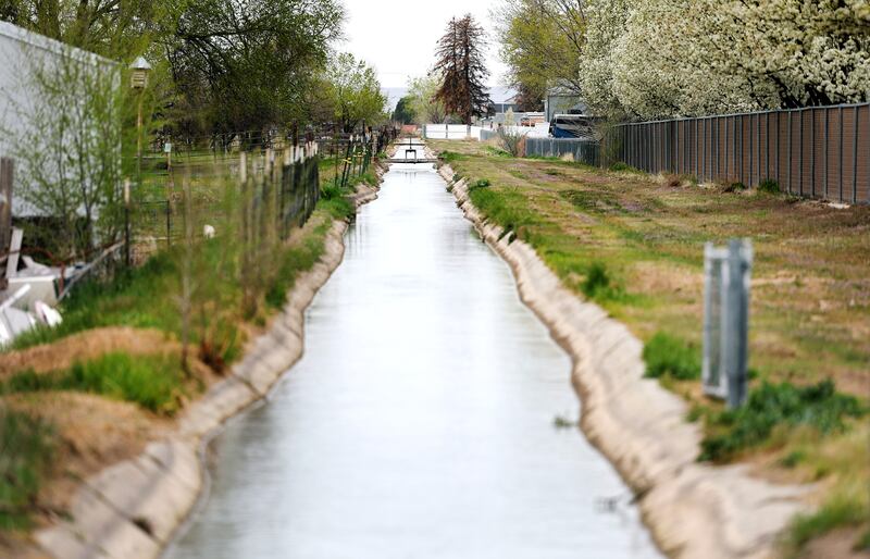 Water runs in an irrigation ditch in Hooper, Weber County.