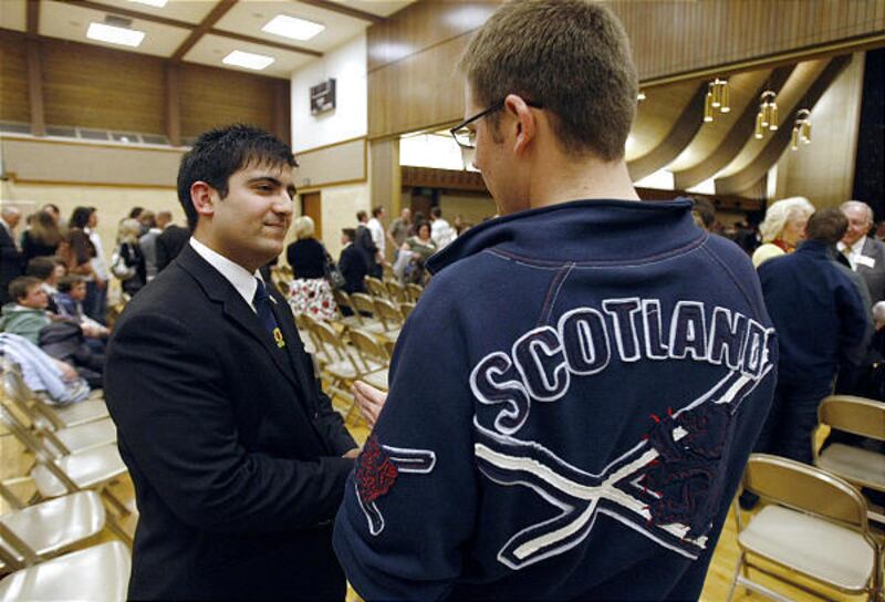 Joe Patel, left, and Chad Harrison talk at the all-Scotland Mission reunion in Holladay this past April.