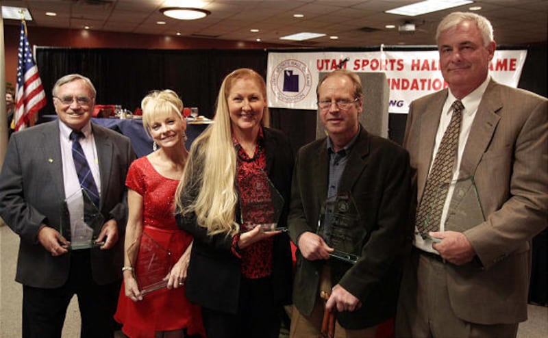 2008 Utah Sports Hall of Fame inductees Chick Hislop, left, Debra Stark, Lori Parrish Salvo, Jeff Lowe and Gordon Jolley at Tuesday's induction banquet at EnergySolutions Arena.