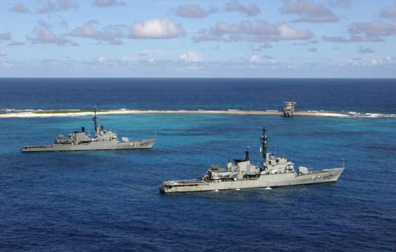 Venezuelan Navy war ships anchor off Isla de Aves, or "Bird Island," in this, Saturday, Oct. 15, 2005 file photo. The government of Guyana said Friday that Venezuela's navy has detained a ship operated by a U.S. oil company in waters disputed by the neigh