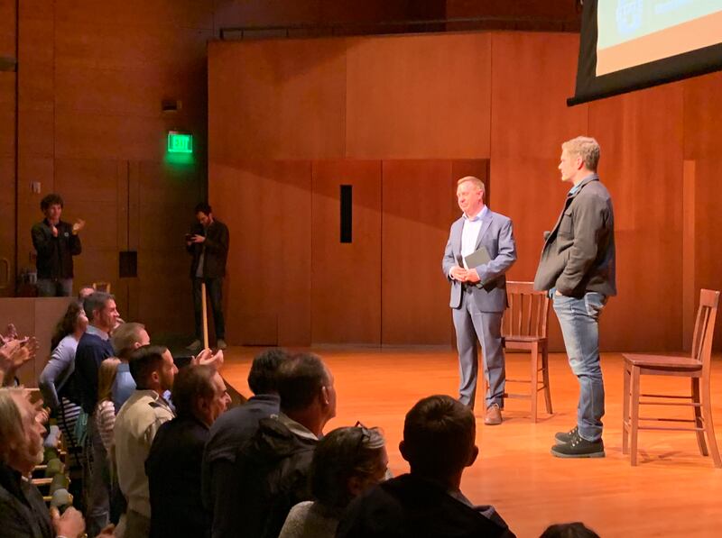 Dallas Jenkins, creator of “The Chosen,” receives a standing ovation at the end of an event at Utah State University.