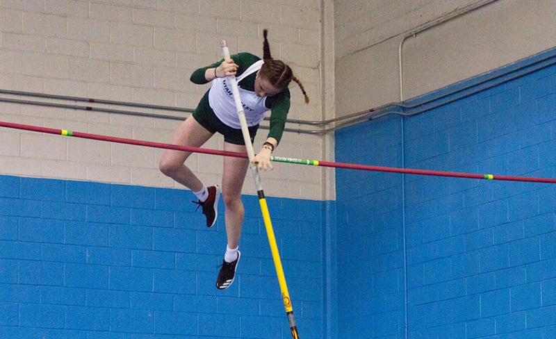 Utah Valley freshman Olivia Neal jumps over the bar. Neal topped UVU women's track and field long-standing pole vault record this weekend at the Jackson's Nike Boise Indoor Invite.