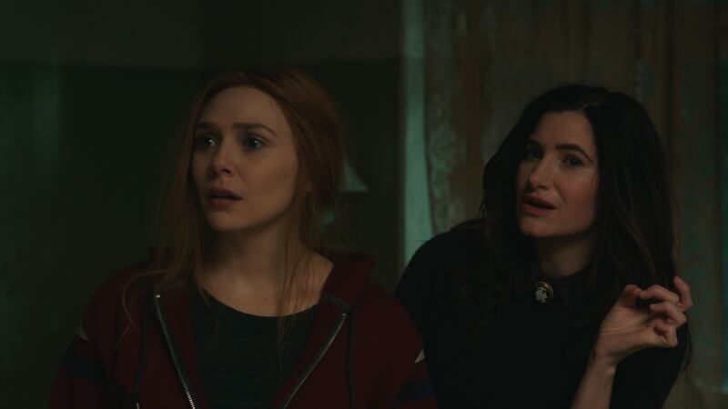 Elizabeth Olsen as Wanda Maximoff and Kathryn Hahn as Agatha Harkness in ‘WandaVision.’