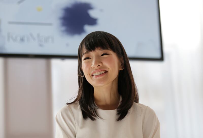 Marie Kondo speaks at a media event.