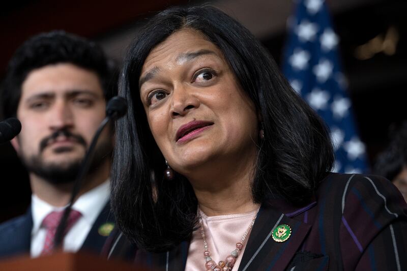 Rep. Pramila Jayapal, D-Wash., right, next to Rep. Greg Casar, D-Texas, speaks during a news conference on May 24, 2023.