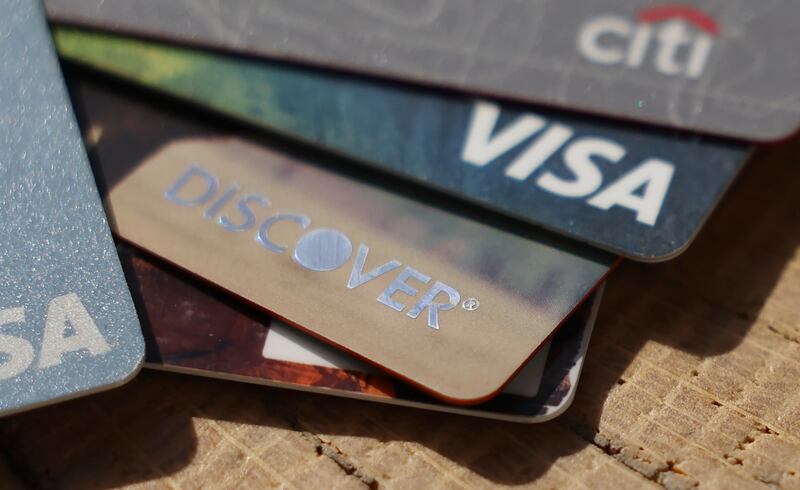 A collection of credit cards are displayed in this illustrated photo on Aug. 3, 2022.