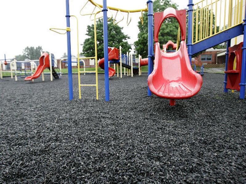 Ground-up recycled tire crumbs cover this playground behind the K-2nd grade elementary Dickerson School in Chester, N.J., Wednesday, June 3, 2009.  The government is reconsidering whether fake turf in playgrounds and sports fields made of ground-up tires