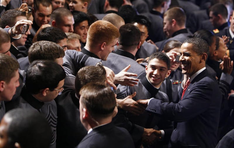 President Barack Obama greets cadets Tuesday at the U.S. Military Academy at West Point, N.Y., after ordering more troops to Afghanistan.