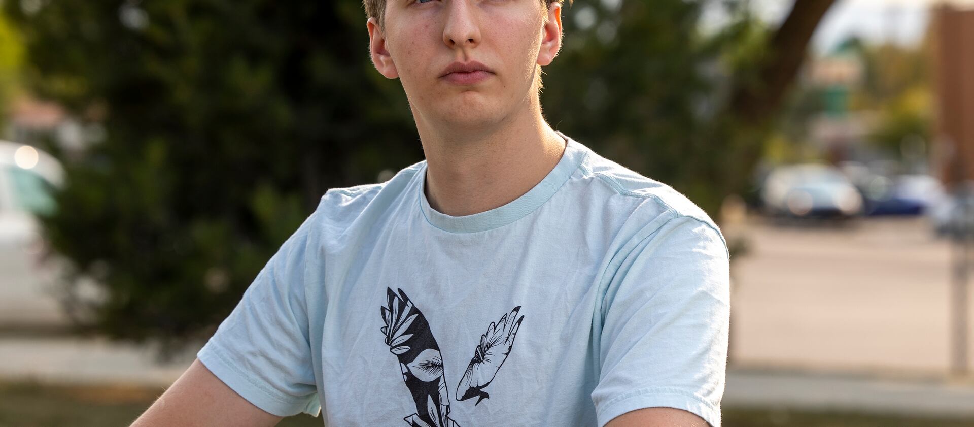 Cole Squire, a former certified nursing assistant at University of Utah Health, poses for photos at Heritage Park in Kaysville on Wednesday, Sept. 22, 2021.