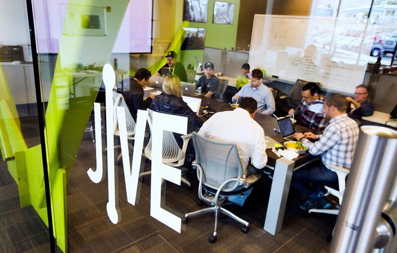 FILE - Employees attend a lunch meeting at Jive Communications in Lindon on Friday, March 10, 2017.