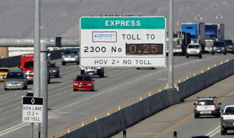 Vehicles travel in the HOV lane on I-15.