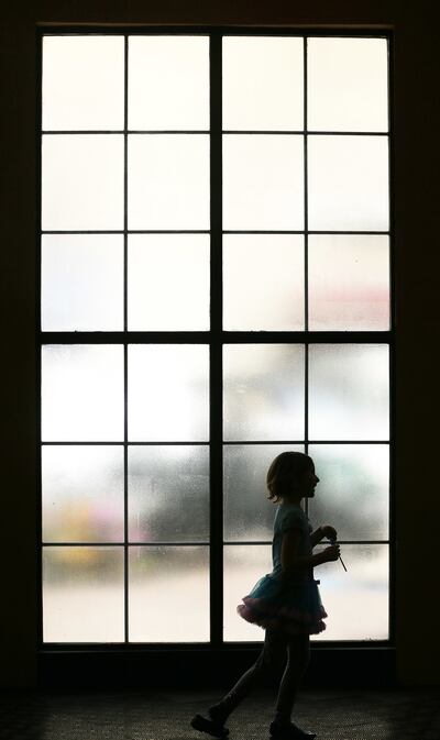 A youngster plays at Gateway in Salt Lake City Saturday, March 26, 2016.