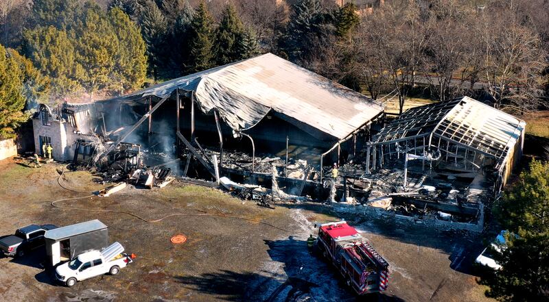 Fire personnel investigate after Tuesday evening’s two-alarm fire in an unoccupied home in Orem on Wednesday, Dec. 27, 2023.