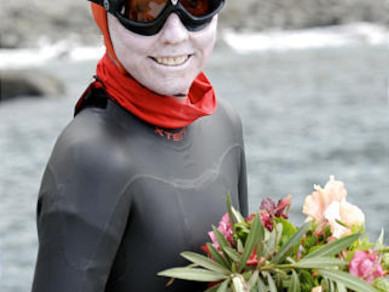 Jennifer Figge poses for a picture after her arrival in Trinidad on Thursday.
