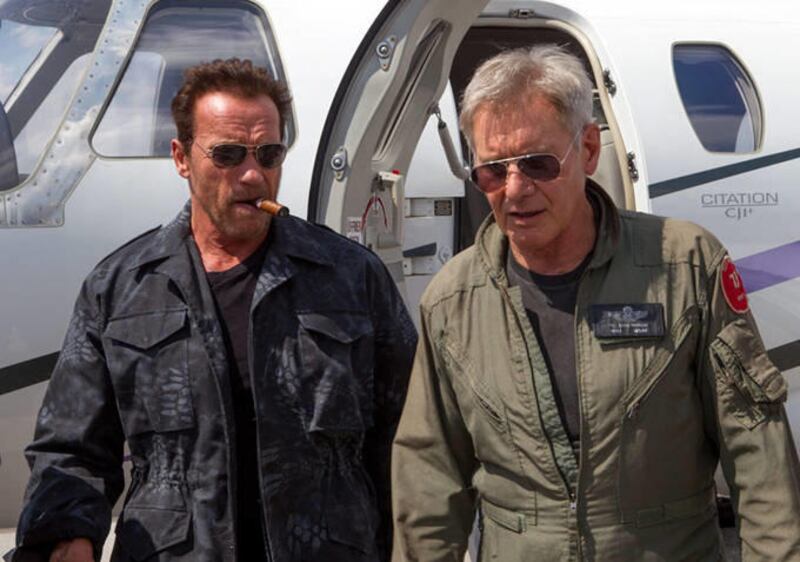 Arnold Schwarzenegger, left, and Harrison Ford are among the array of 80s and 90s action stars in "The Expendables 3," opening Aug. 15.
