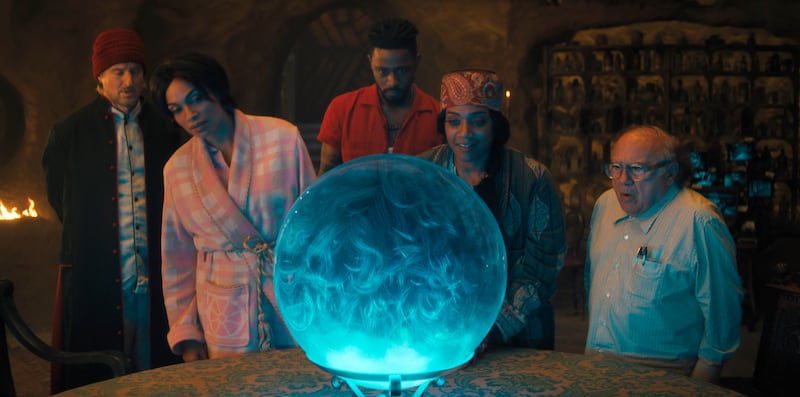 Owen Wilson, Rosario Dawson, LaKeith Stanfield, Tiffany Haddish and Danny DeVito in a scene from “Haunted Mansion.”