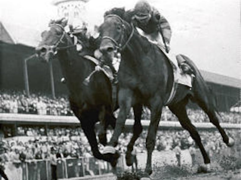 Iron Liege, right, edges out Gallant Man at the finish line to win the Kentucky Derby on May 4, 1957. The finish was about as wild as one could ever see.