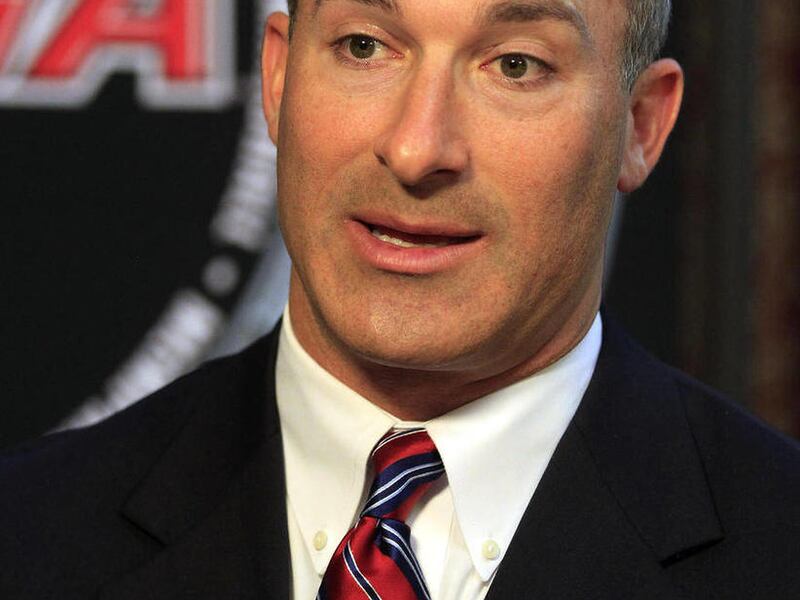 FILE - This July 25, 2012 file photo shows Houston coach Tony Levine talking with a reporter during an interview at the NCAA college football Conference USA media day in Dallas. Levine promises none of the changes will throw off the high-powered offense t