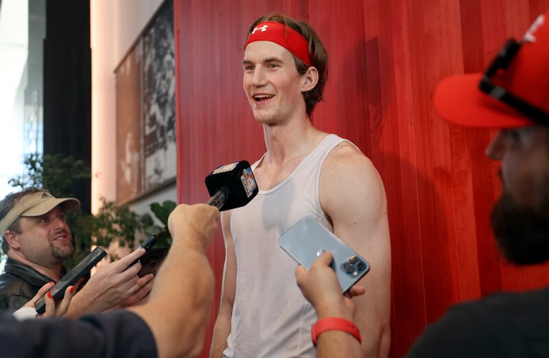Utah Runnin’ Utes center Branden Carlson talks to media before practice at the Jon M. and Karen Huntsman Basketball Facility.