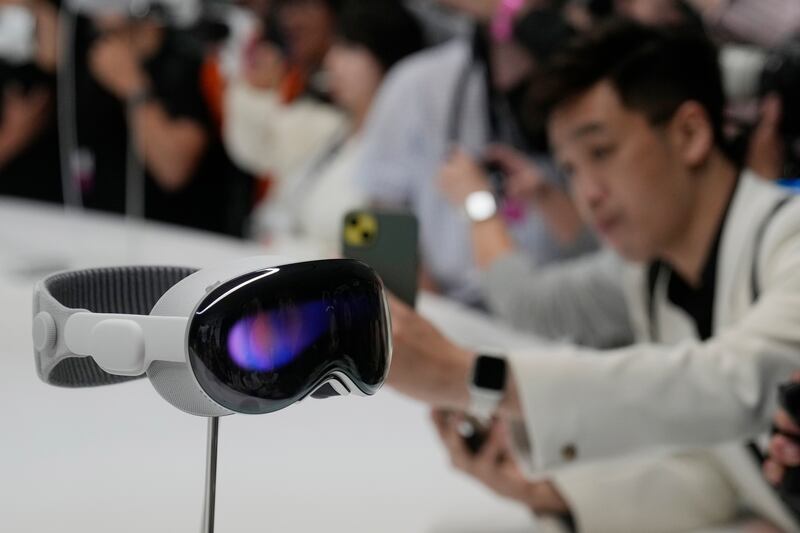 The Apple Vision Pro headset is displayed in Cupertino, Calif., at the company’s annual developers conference, June 5, 2023.