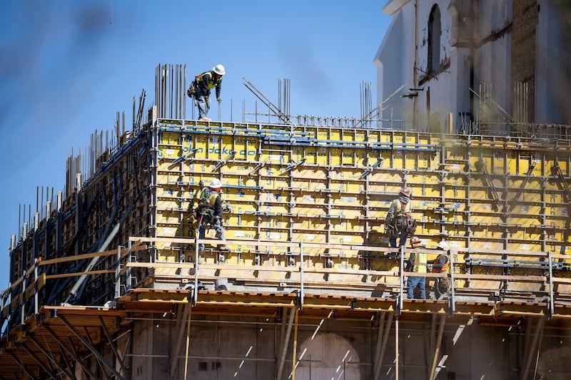 A construction crew works on the St. George Utah Temple.