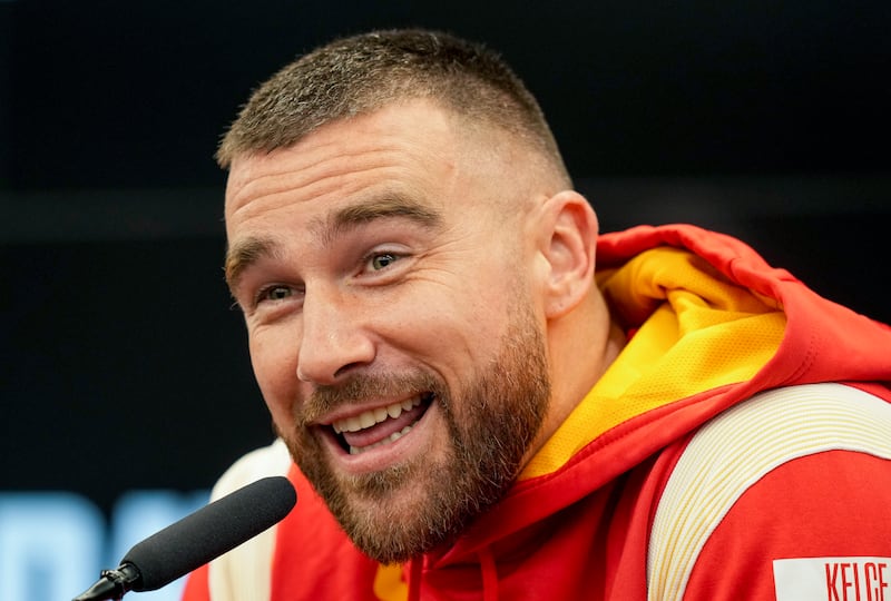 Kansas City Chiefs tight end Travis Kelce reacts when asked about Taylor Swift in Frankfurt, Germany, Friday, Nov. 3, 2023.