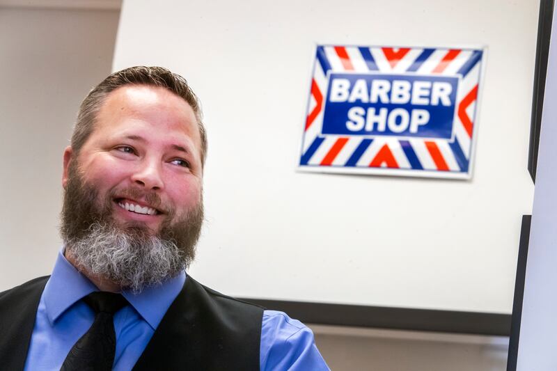 David Bean, owner of Dave's Barber Shop in Daybreak, is pictured on Tuesday, March 5, 2019. Bean is opposed to a bill that would tax a wide range of services, including everything from haircuts to lawyers.
