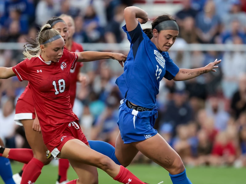 Utah’s Lilliah Blum (18) and BYU’s Brecken Mozingo (13) compete for control of the ball in Salt Lake City on Sept. 9, 2023.