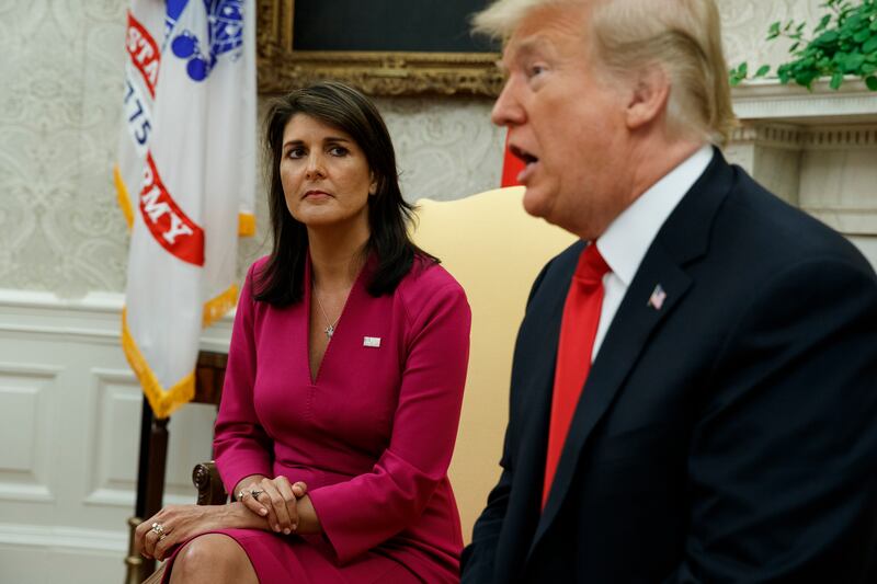 President Donald Trump speaks during a meeting with outgoing U.S. Ambassador to the United Nations Nikki Haley.