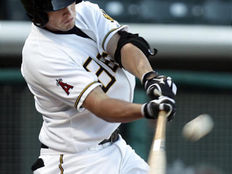 Peter Bourjos (Salt Lake Bees) hits a triple against the Tacoma Rainiers at Spring Mobile Ballpark. July 5, 2010.