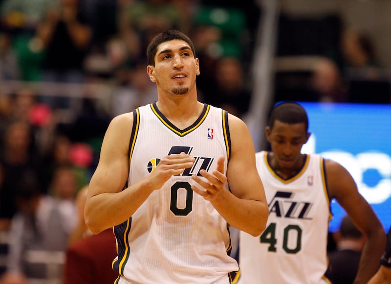 Enes Kanter applauds after the Utah Jazz defeats the Portland Trailblazers in pre-season NBA basketball.