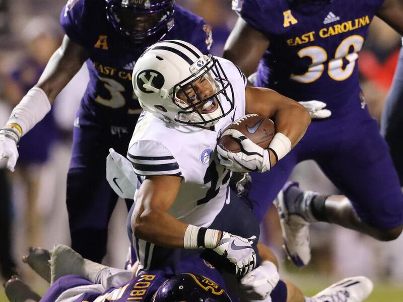 BYU wide receiver Micah Simon fights for extra yardage.