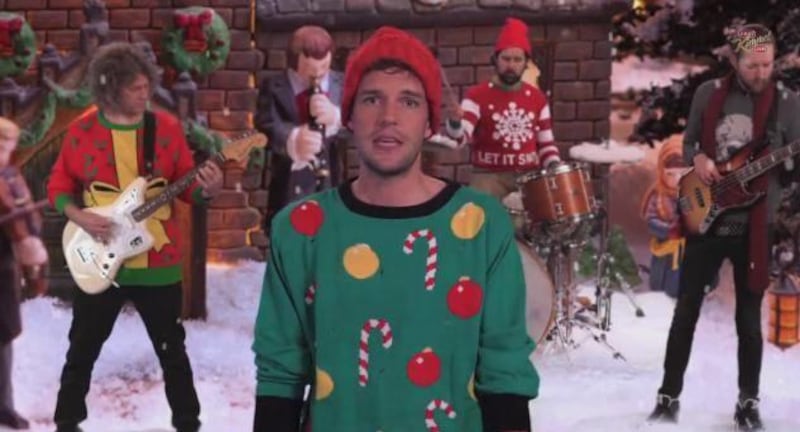 LDS frontman Brandon Flowers and his band donned ugly Christmas sweaters for the music video.